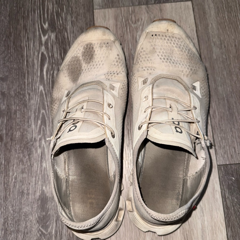 On Running Cream Athletic Shoes with Minimalist Design